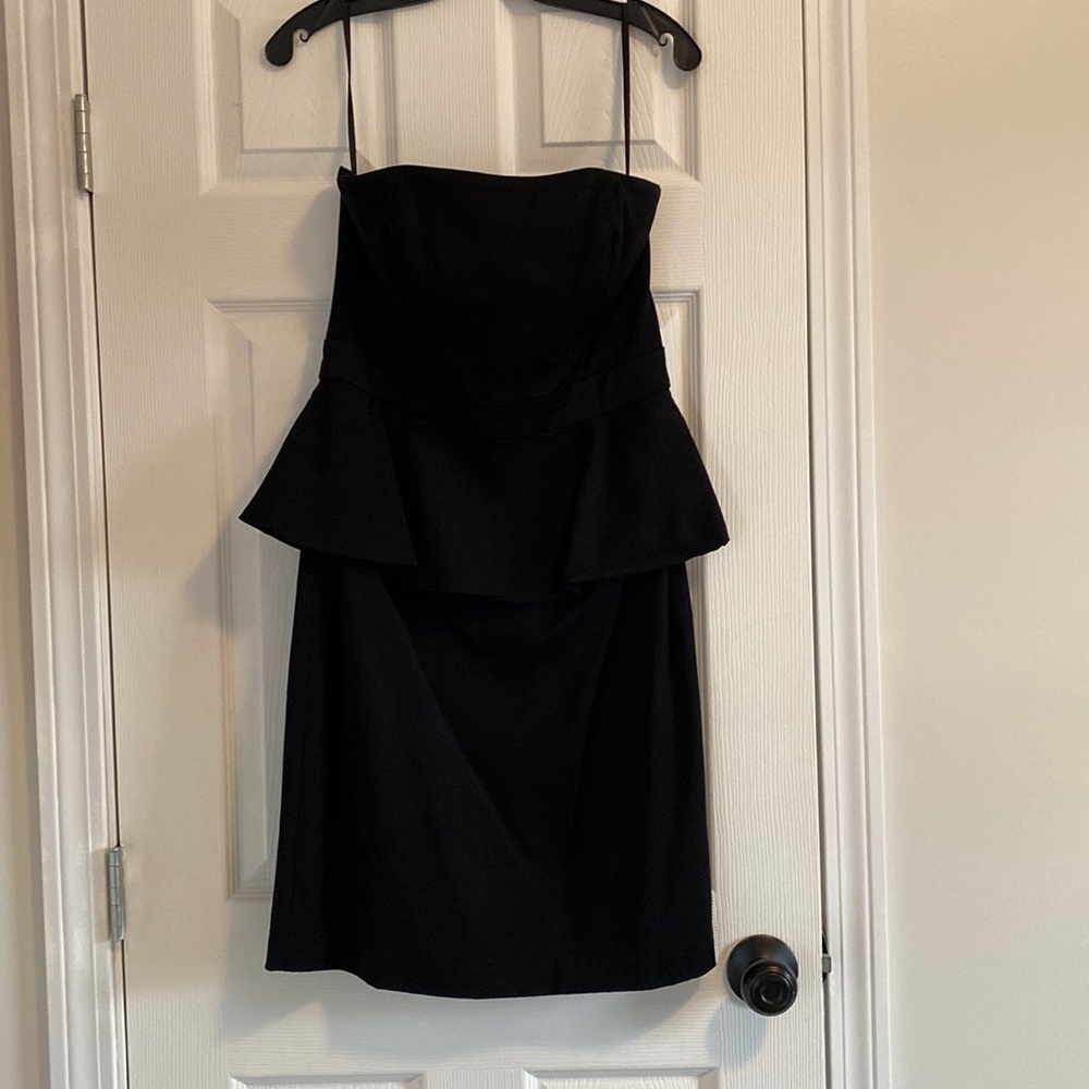 Strapless black peplum dress